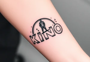 Forearm tattoo of the words kino central with graphic design of the galaxy behind it with stars in the background of the design with a man standing over top of the N in the word kino tattoo idea