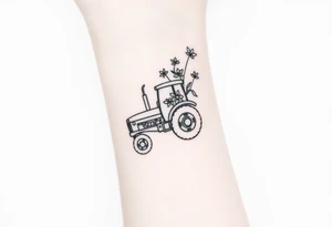 A feminine tractor with flowers tattoo idea