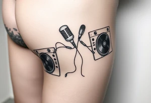 Microphone turntables and music notes on a woman's thigh tattoo idea