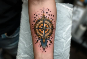 A vintage-style celestial tattoo featuring Sagittarius stars constellation, a compass, and golden sunbursts on a parchment-colored background. tattoo idea