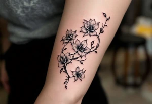 more so rare flowrs in a vine wrapped around my arm tattoo idea