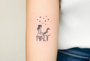 woman playing piano under the stars tattoo idea