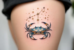 The star constellation of Cancer appears in golden thread style above a softly rendered seafoam crab. tattoo idea