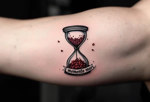 A grayscale hourglass cracked and spilling red petals, with "memento mori" in inked calligraphy curling along the base. tattoo idea