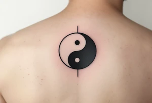 A yin-yang symbol split between two tattoos: the father’s half in black and white on one wrist, and the second complementary half in the same colors on the other wrist. tattoo idea