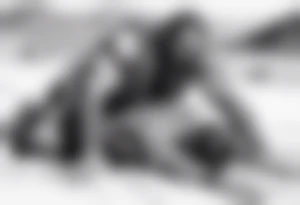man crawling in a desert reaching to the cross of Christ tattoo idea