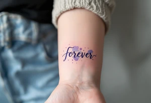 A watercolor-style "forever" in splashes of blue and purple, surrounded by paintbrush strokes. tattoo idea