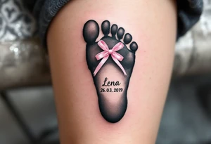 A tiny footprint in soft gray with a pink ribbon tied around it, personalized with a birthdate Lena 26. 03. 2019. tattoo idea
