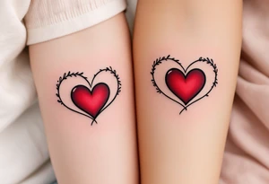 A matching couple’s design: black infinity loops with mirrored crimson hearts in the center. tattoo idea