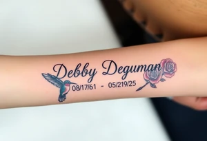 Tattoo of the exact name Debby Deguzman in chunky curly cursive with the exact dates of 08/17/61-05/29/25 surrounded by 1 hummingbird and 1 rose tattoo idea