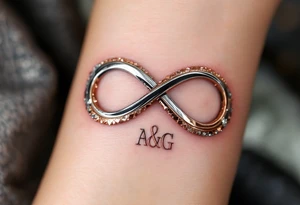 A metallic infinity symbol with engraved initials, reflecting chrome silver and rose gold, emphasizing an unbreakable bond. tattoo idea