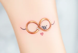A delicate infinity symbol in shimmering champagne gold, intertwined with wedding rings engraved with the couple’s initials tattoo idea
