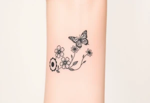 A small feminine tractor with  2 flowers on it and butterfly tattoo idea