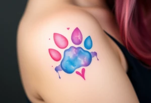 A watercolor-style paw print blending vibrant hues of pink, blue, and purple, creating the shape of a heart tattoo idea