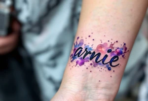 A galaxy-style tattoo with deep purples and blues, spelling out the son's name Arnie in nebula. tattoo idea