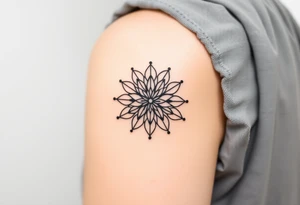 A Flower of Life pattern with delicate dot work shading placed in cyrcle tattoo idea