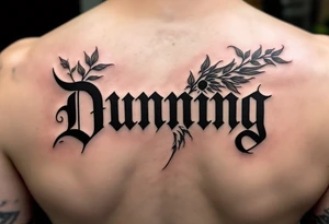 Dunning, details include angel wing, greek type of font,jungle leaves , tiger scratch tattoo idea