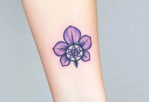 A single Violet with detailed compass at its center representing feminine power and an ankh or Celtic knot tattoo idea