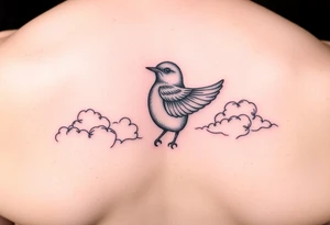 Kentucky bluebird with realistic clouds tattoo idea