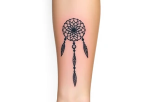 native dreamcatcher with flowing feathers and sacred beads tattoo idea