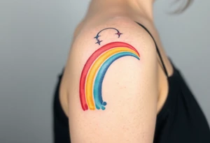 A rainbow with a halo above it to honour a rainbow baby tattoo idea