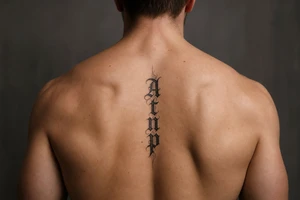 Atnp in old English calligraphy up 
and down tattoo idea