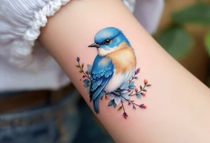 Puffy bluebird surrounded by wild flowers tattoo idea