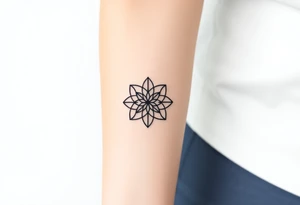 A minimalist black ink Flower of Life, centered on the forearm, with perfect geometric symmetry tattoo idea