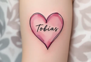 A soft pink heart outlined in black, cradling the name Tobias in cursive. tattoo idea