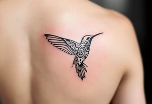 smaller hummingbird with Indigenous style tattoo idea