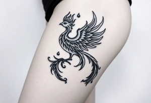majestic fiery phoenix surrounded by fire. with a crown of fire flapping wings with a flaming tail tattoo idea
