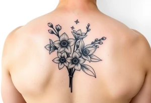 small bit of color, bouquet of daffodils, daisies, lily of the valley tattoo idea