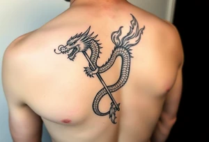 Flow dragon staff fire on the chest tattoo idea