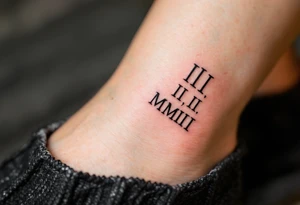 III.III.MMIII in black and crimson ink wrapped around the wrist like a bracelet, symbolizing triplets’ birthday. tattoo idea