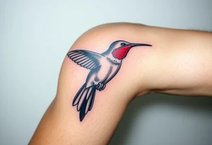 A hummingbird carrying an ankh in its beak
 (only red , blue and black are possible colors) tattoo idea