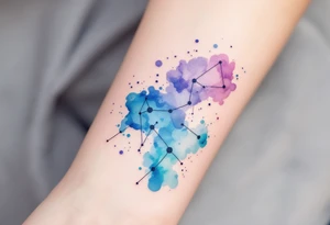 A watercolor-style Sagittarius constellation in shades of indigo, teal, and violet splashed across the forearm like a night sky. tattoo idea