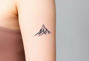 Two minimalist mountains stacked vertically, one sharp and clear at the top, the other fading into mist at the bottom tattoo idea