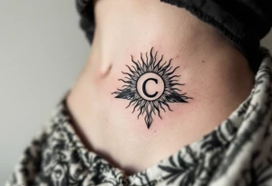 lily letter c and a rising sun triangle tattoo idea