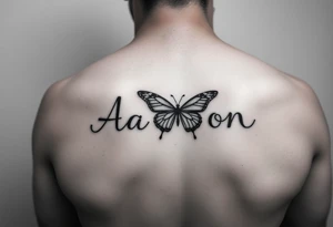 the name aaron with a butterfly and a semicolon , on the hand tattoo idea