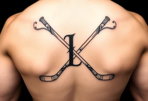 Ella with hockey sticks for L tattoo idea