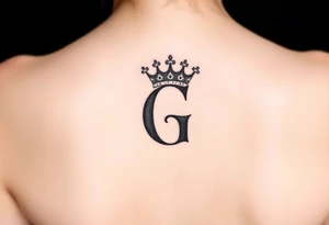 a capital G letter with a crown tilted to the left of it tattoo idea