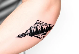 Pikes peak landscape with trees and moon in an arrowhead tattoo idea