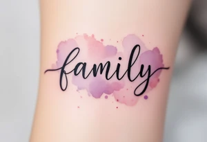 A watercolor splash in dusty rose and lavender behind the word family in sleek black ink. tattoo idea