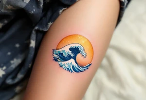 A sparkling sapphire-colored wave crests under a golden sky on the lower leg. tattoo idea