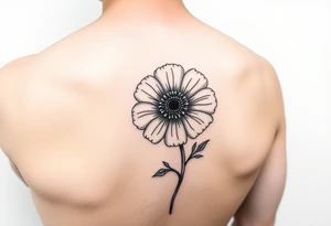 Minimalists marigold flower with g tattoo idea