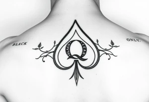 A spade womb tattoo with a Q in the center, with three points around the outside. The first reading, "BLACK". The second reading, "SEED". The third reading, "ONLY". tattoo idea