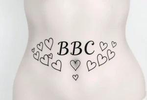 text reading "BBC" across a womb tattoo surrounded by hearts tattoo idea