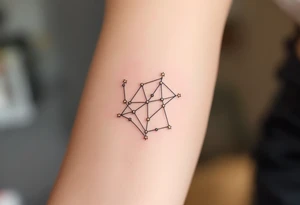 A Sagittarius constellation with stars as tiny gold dots connected by soft gray lines above the collarbone tattoo idea