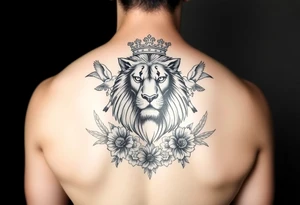 powerful majestic lion with a crown, surrounded by floral ornaments and birds tattoo idea