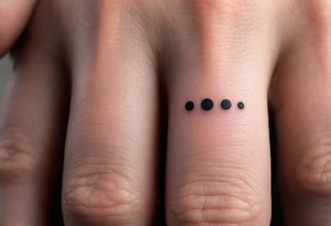 Three fine-line black dots in a row on the finger – Representing body, mind, and spirit in perfect alignment. tattoo idea